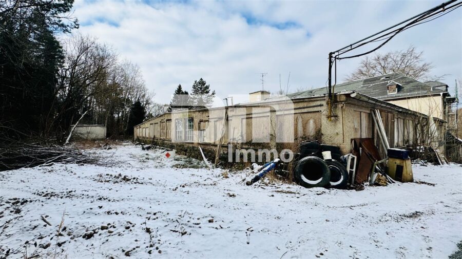 Gewerbeensemble mit Hallen und Büroflächen auf großem Grundstück als Entwicklungareal - Gebäudeteil 1 ehem. Produktion Halle Rückansicht